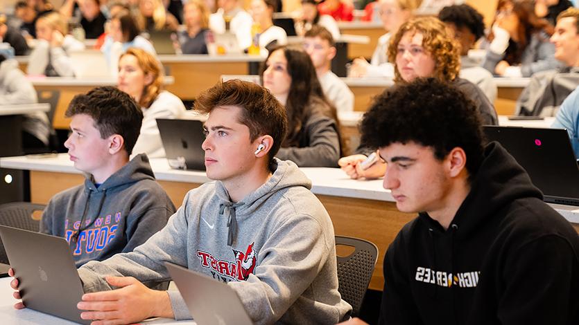 Image of students watching the documentary at the screening in the Dyson Center.